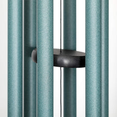 Corinthian Bells patina green hanging on patio illustrating outdoor ambience benefit