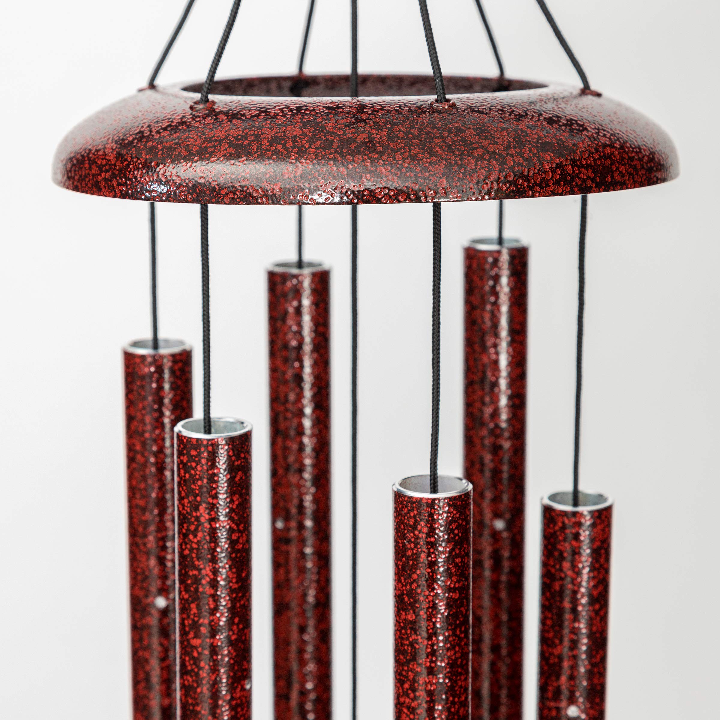 Corinthian Bells wind sail detail in redwood showing balanced design and weather resistance benefit