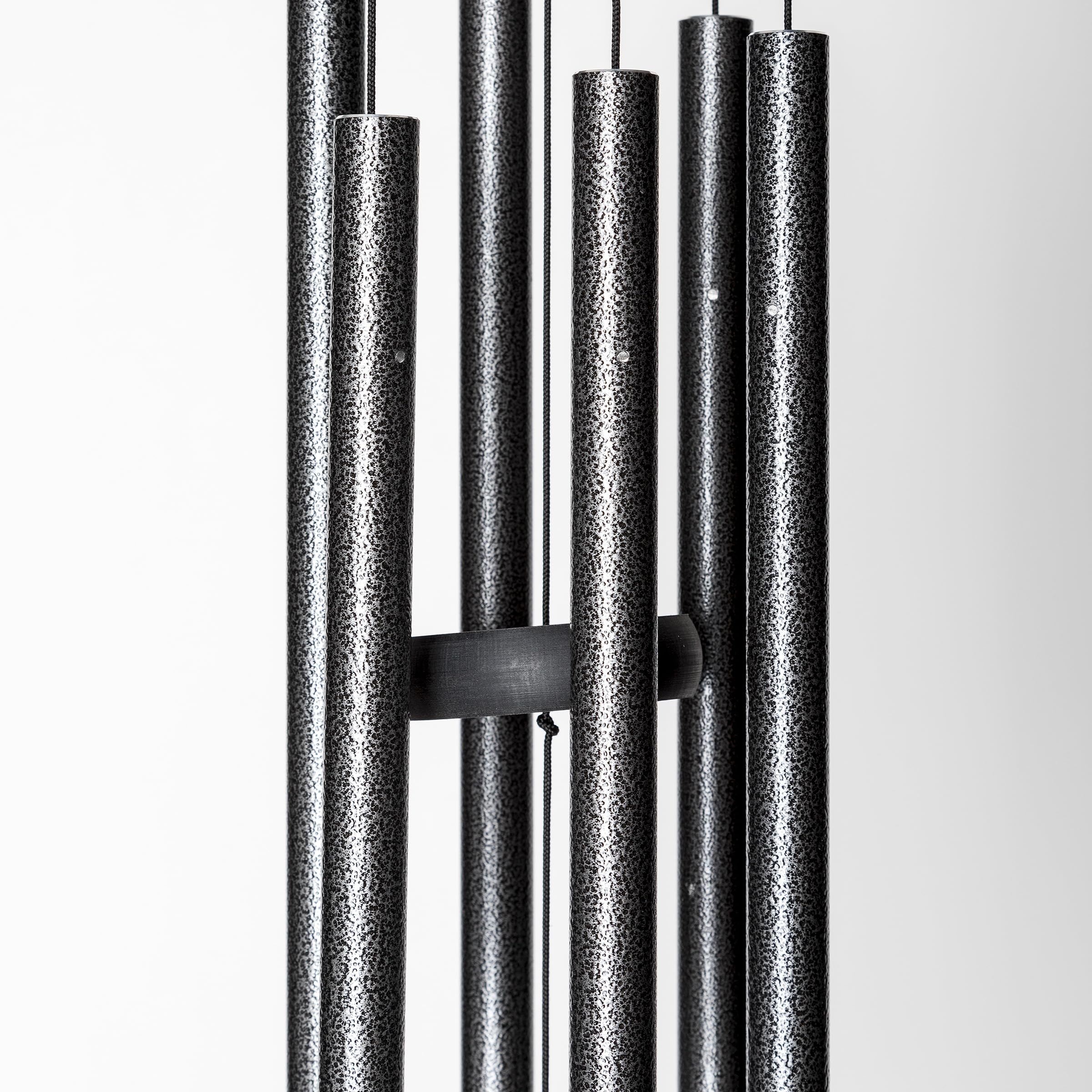 Corinthian Bells beside ruler showing 27-inch scale benefit: compact fit for small spaces
