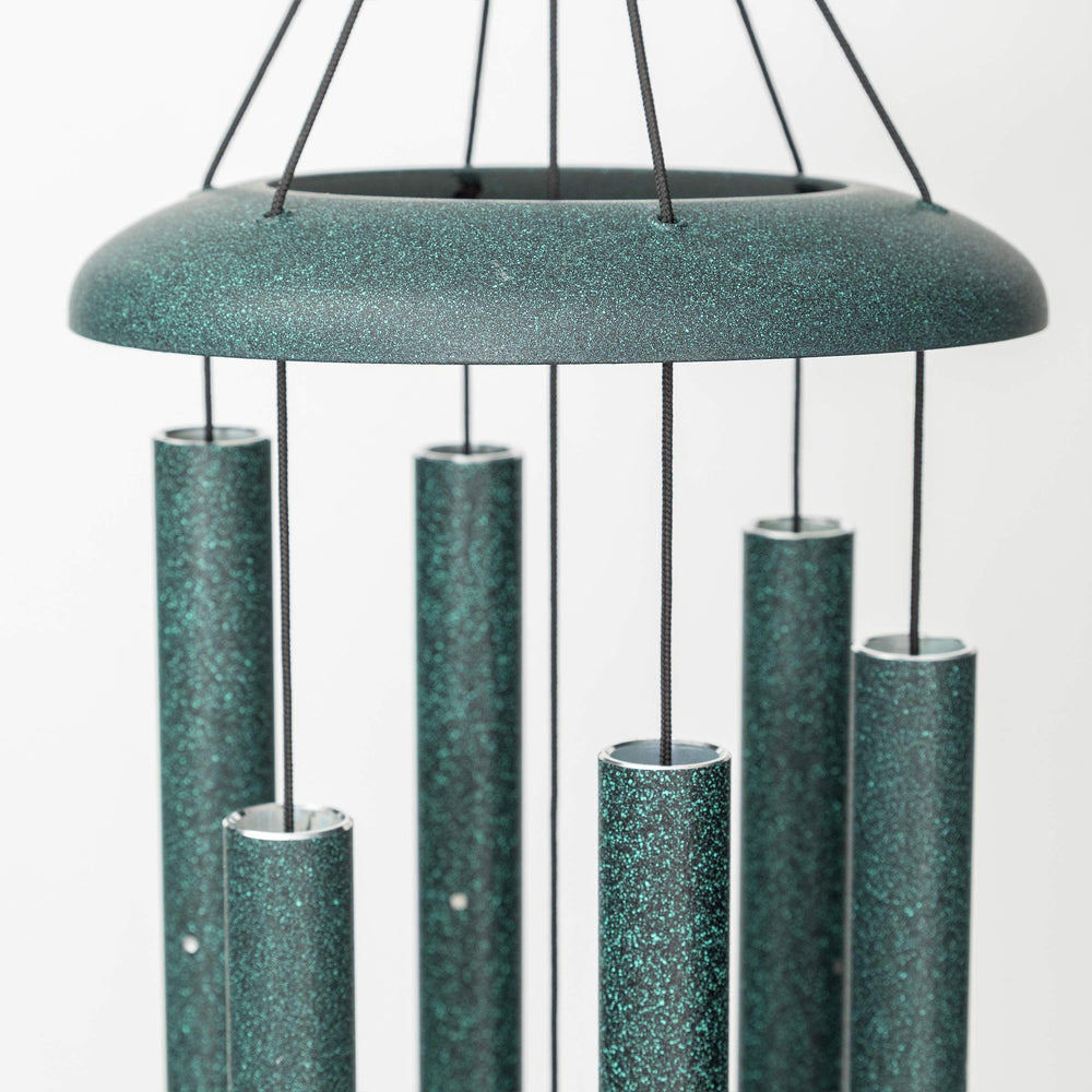 Corinthian Bells top hanging loop and sail showing secure hang and wind activation benefit