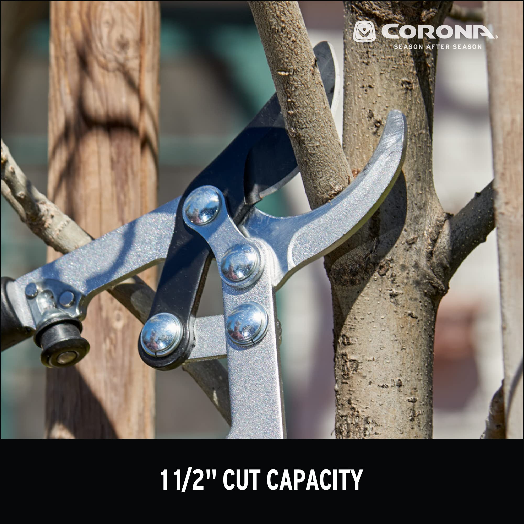 Corona Clipper in use pruning a medium branch, comfortable grip reduces hand strain