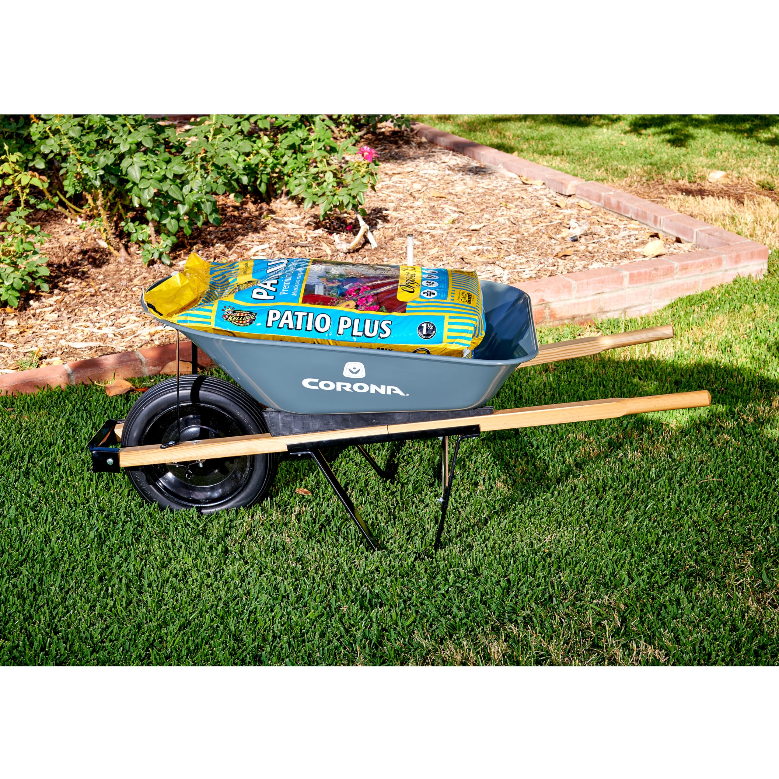 Corona Clipper in garden setting transporting plants for efficient outdoor work