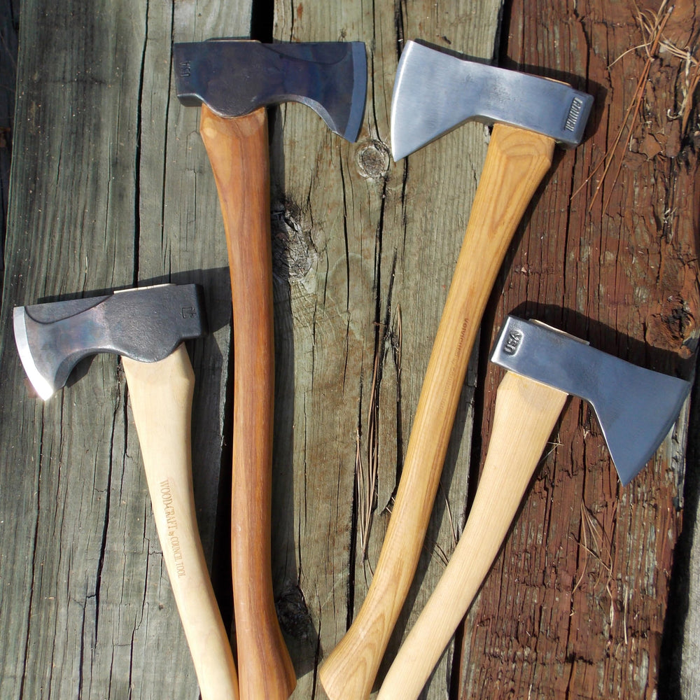 Council Tool axe next to hand showing compact size and easy transport