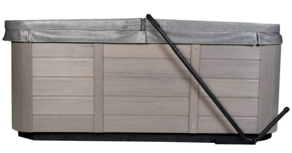 Cover Valet installed on spa in backyard showing space-saving advantage