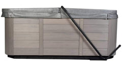 Cover Valet installed on spa in backyard showing space-saving advantage