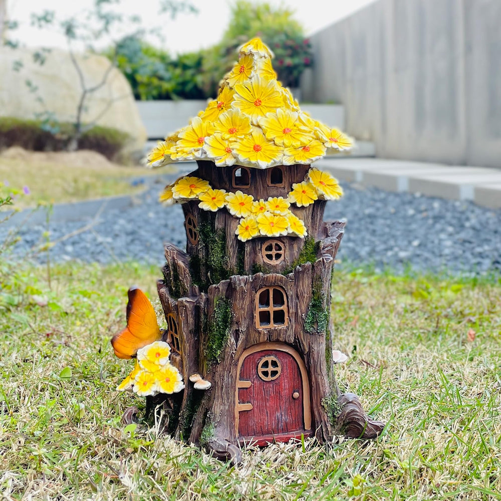 COWOS fairy house front view showing sculpted doors and warm glow for charm
