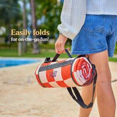 Cozy Club folded and packed with shoulder strap for easy transport