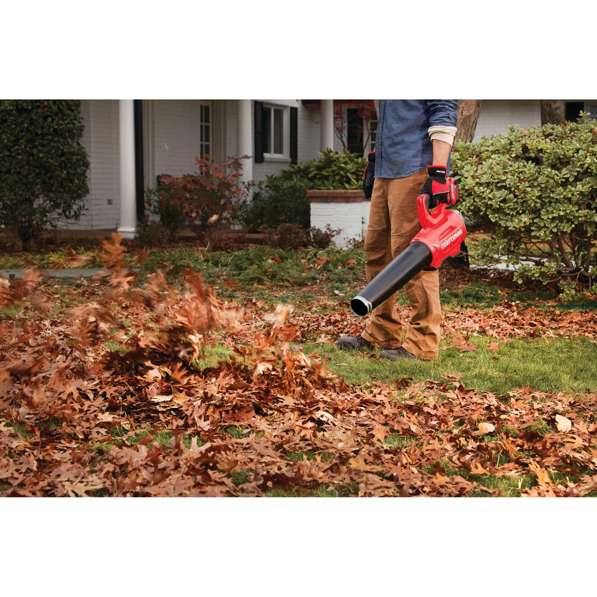 CRAFTSMAN blower clearing leaves demonstrating effective debris movement and control