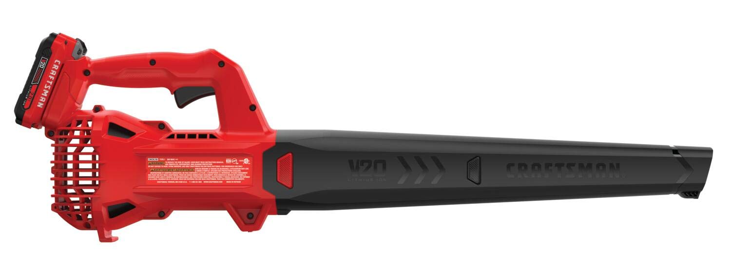 CRAFTSMAN red blower in yard lifestyle shot conveying practical outdoor use