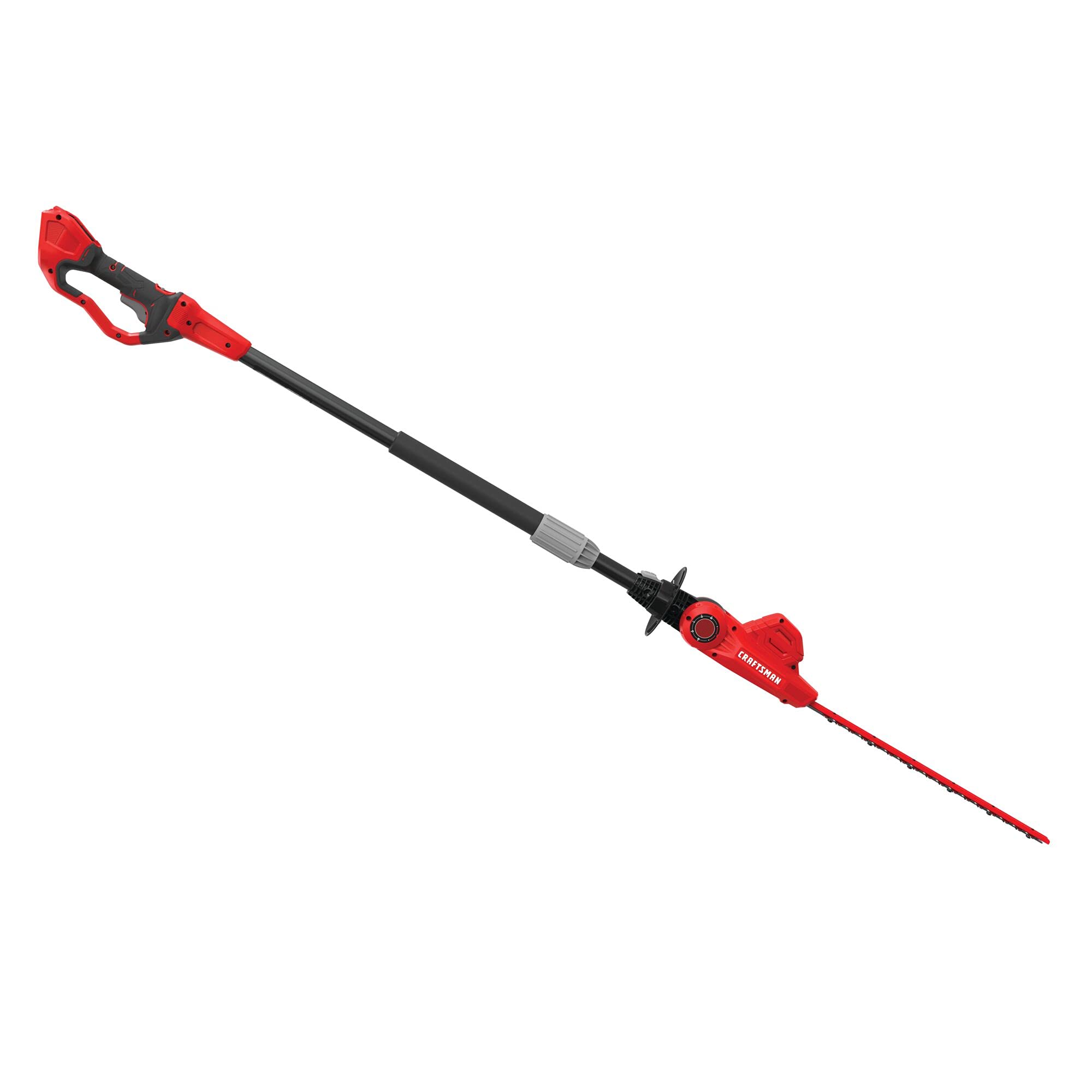 CRAFTSMAN pole trimmer in use reaching a tall hedge for ladder-free trimming