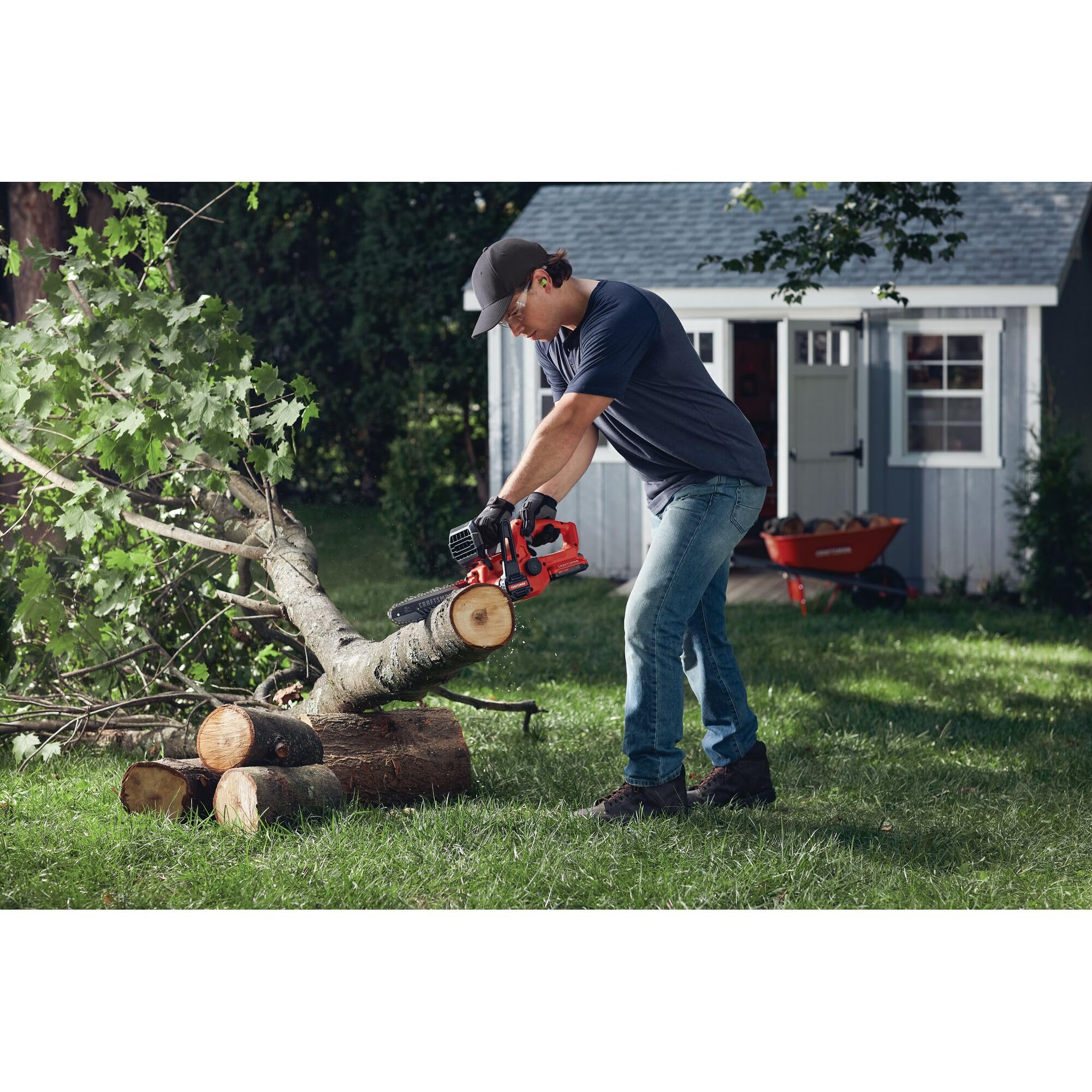 CRAFTSMAN V20 mini chainsaw next to handrail showing compact scale