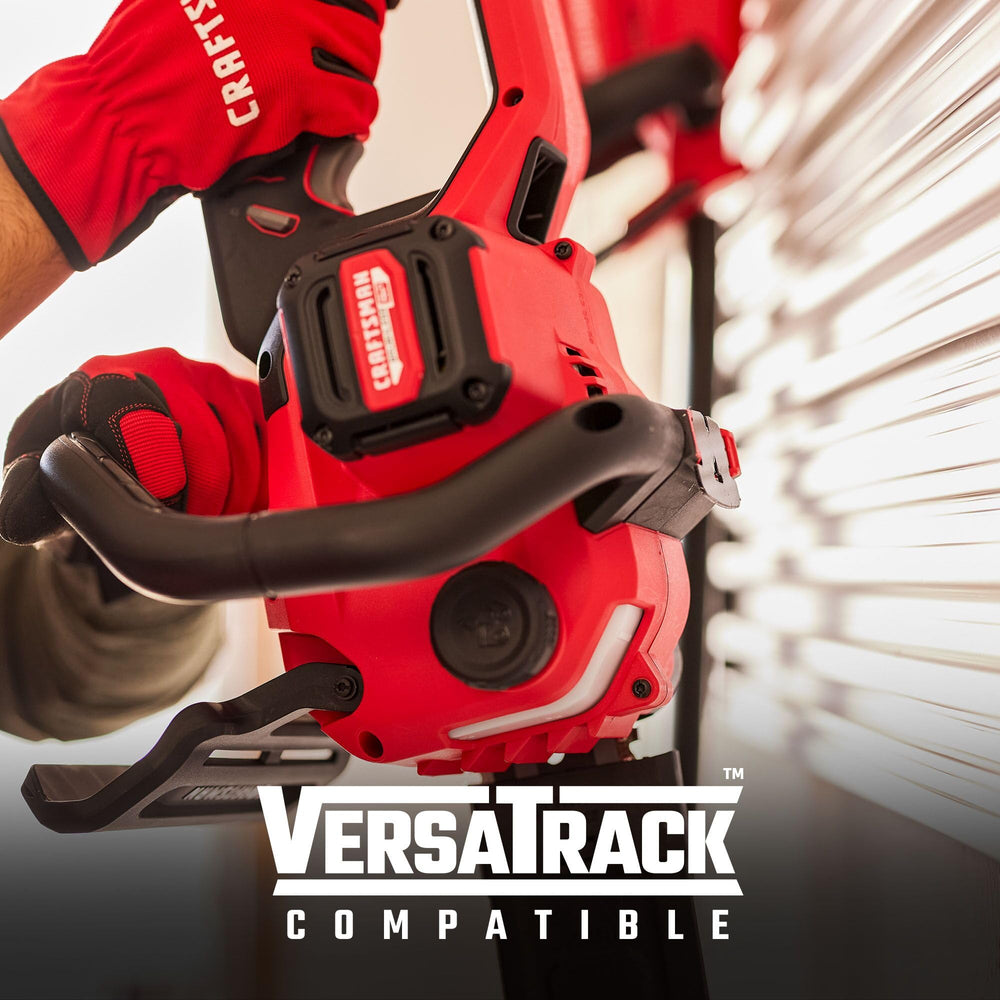 CRAFTSMAN chainsaw hung on VERSATRACK illustrating tidy storage convenience