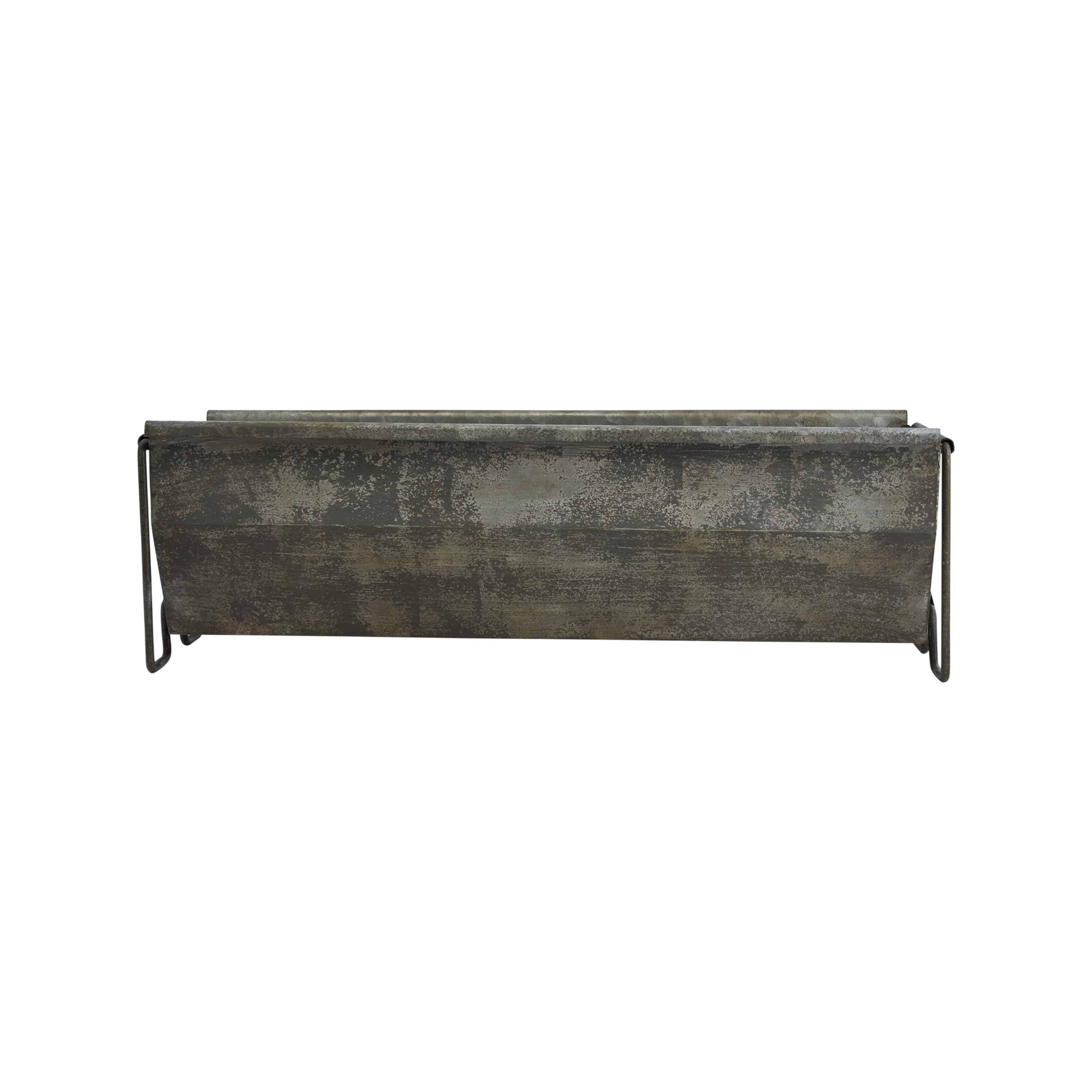 Creative Co-Op trough used as table centerpiece organizing candles and greenery for charm