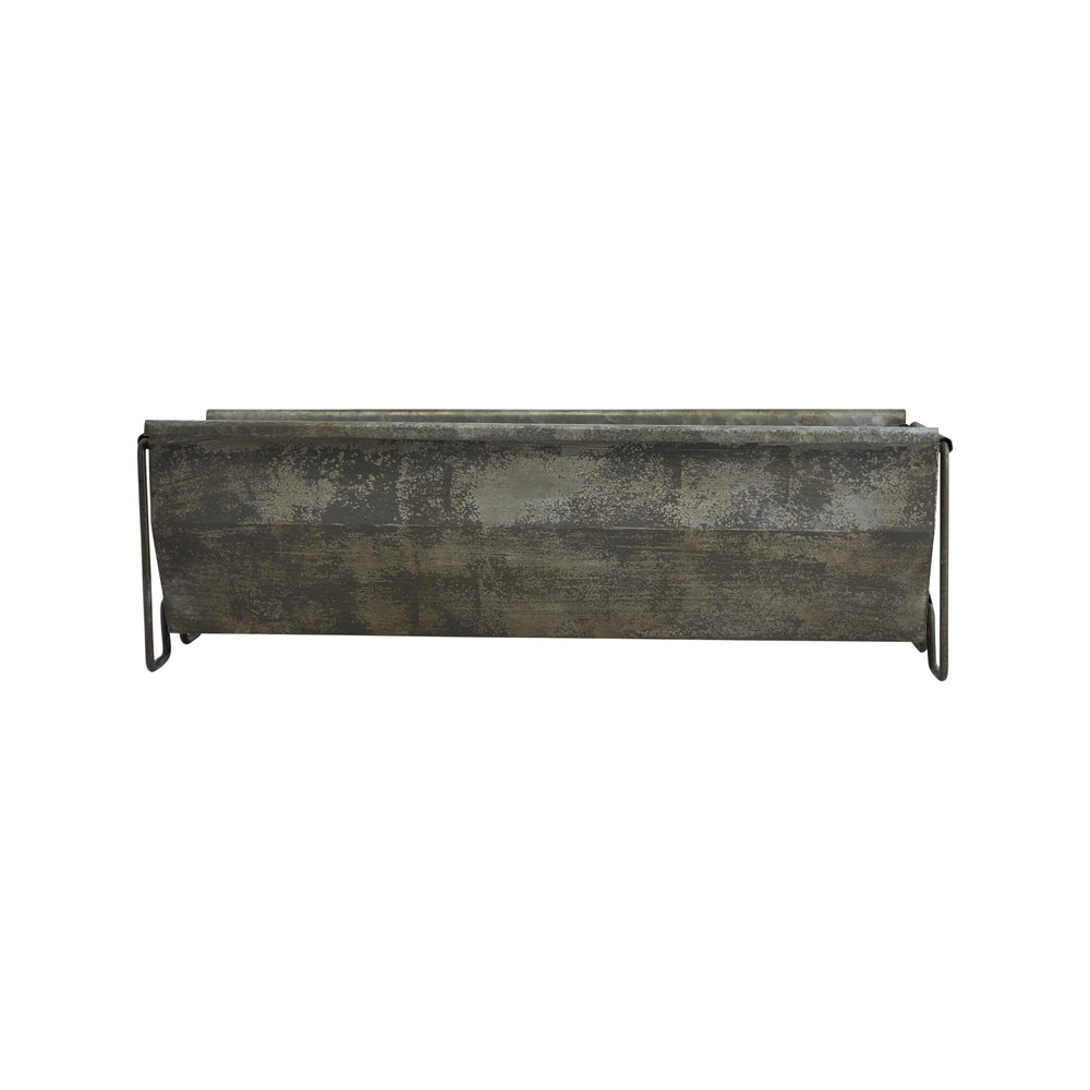 Creative Co-Op trough used as table centerpiece organizing candles and greenery for charm