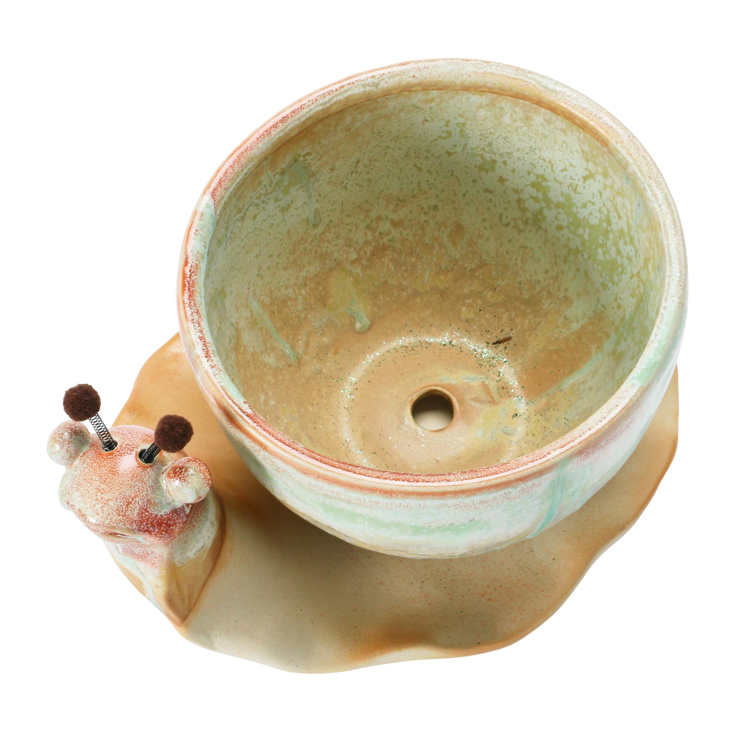 creative co-op snail planter on patio tray protecting surface from water