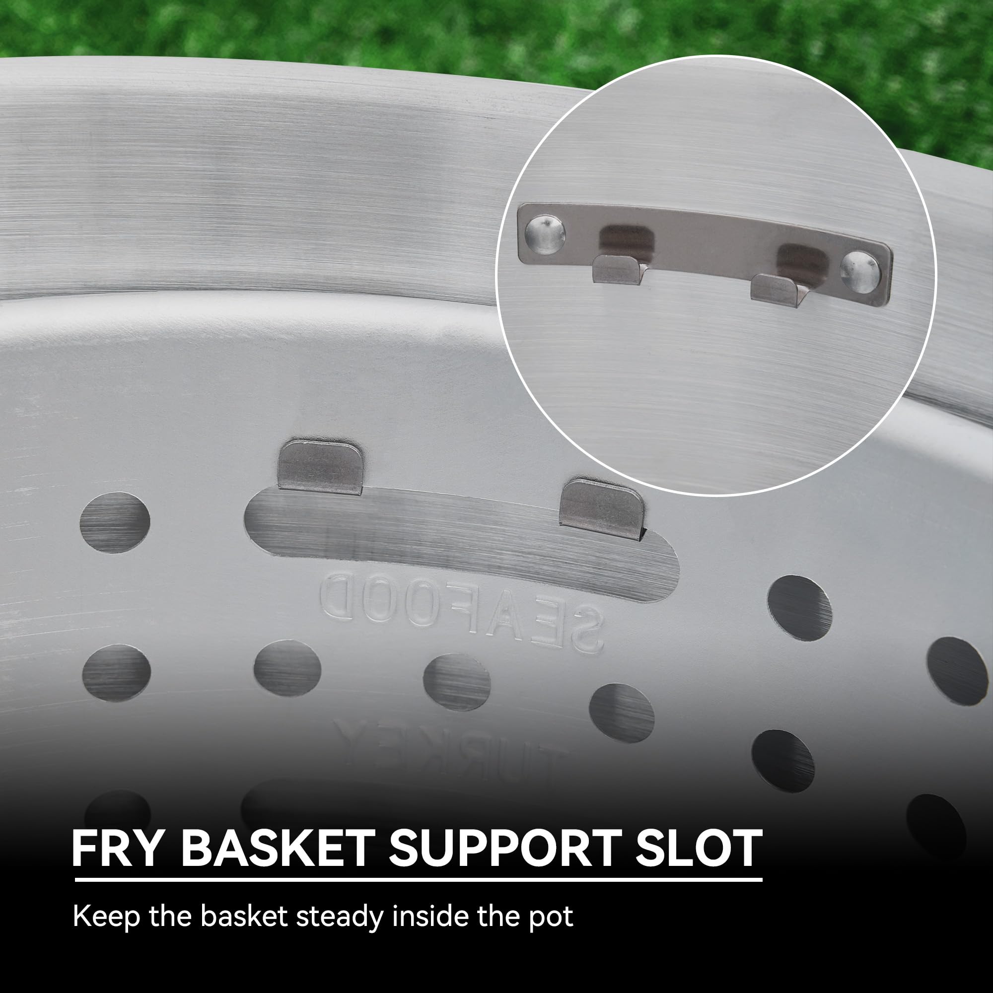 Creole Feast perforated turkey rack detail supporting and draining a fried turkey