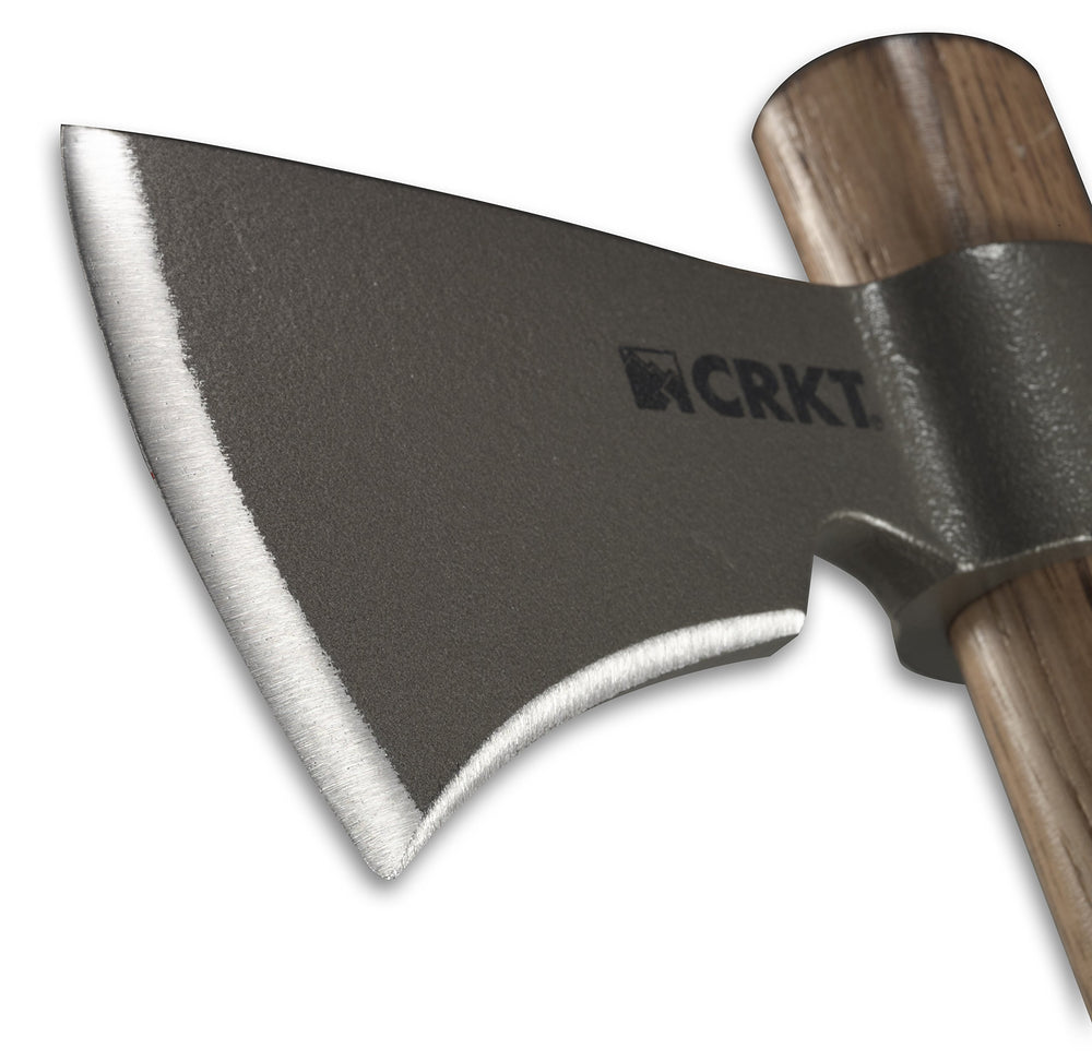 CRKT spike poll in action splitting wood demonstrating focused penetration power