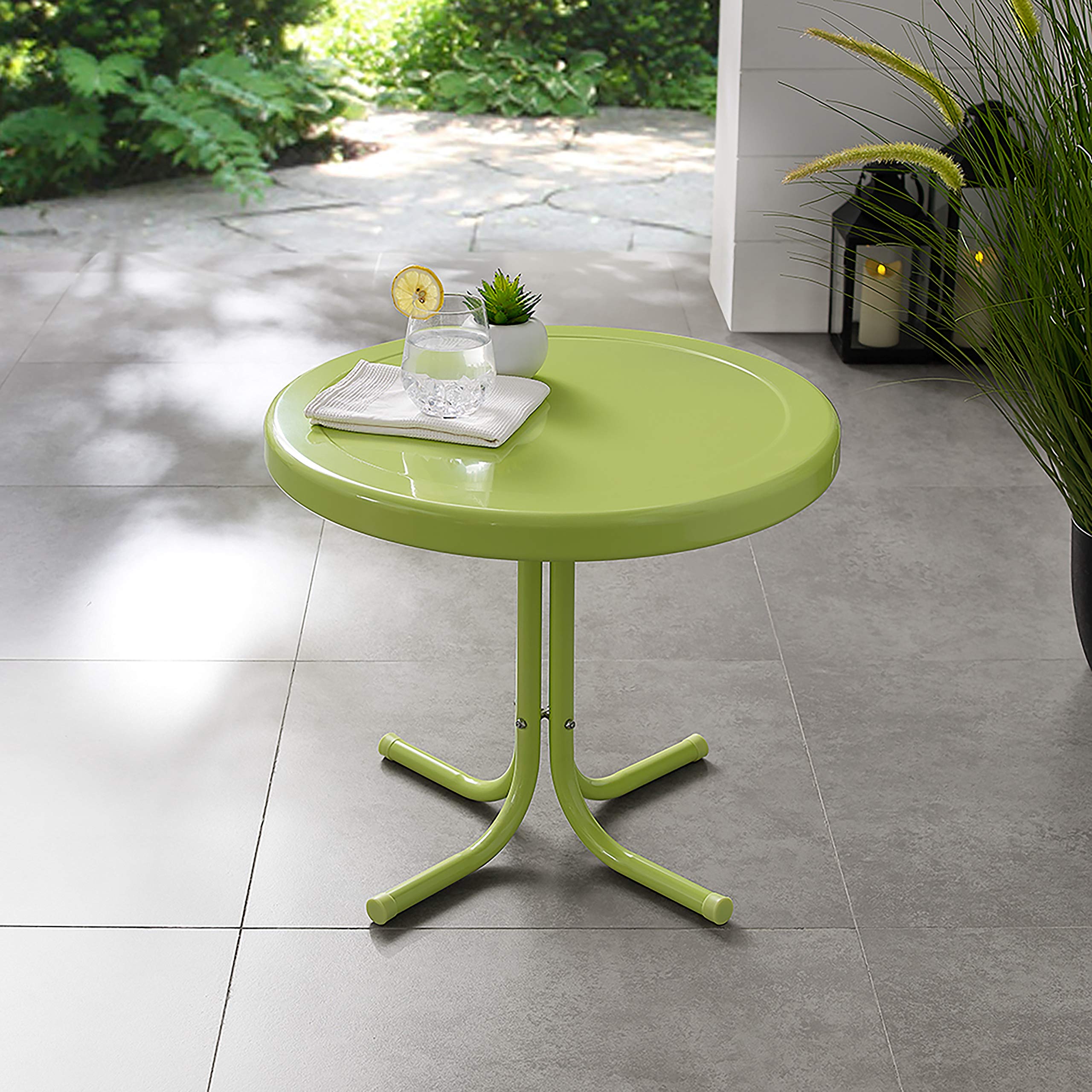 Crosley Griffith in use with drinks and plant showing practical placement benefit: functional outdoors