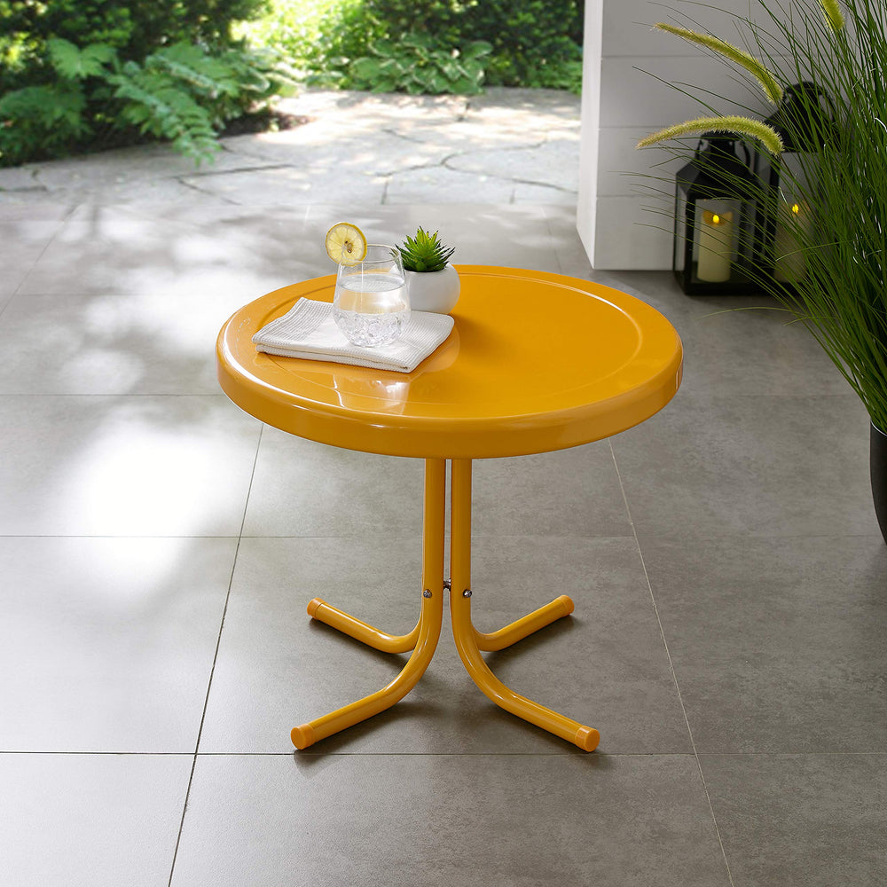 Crosley Griffith next to chair illustrating compact size and fit