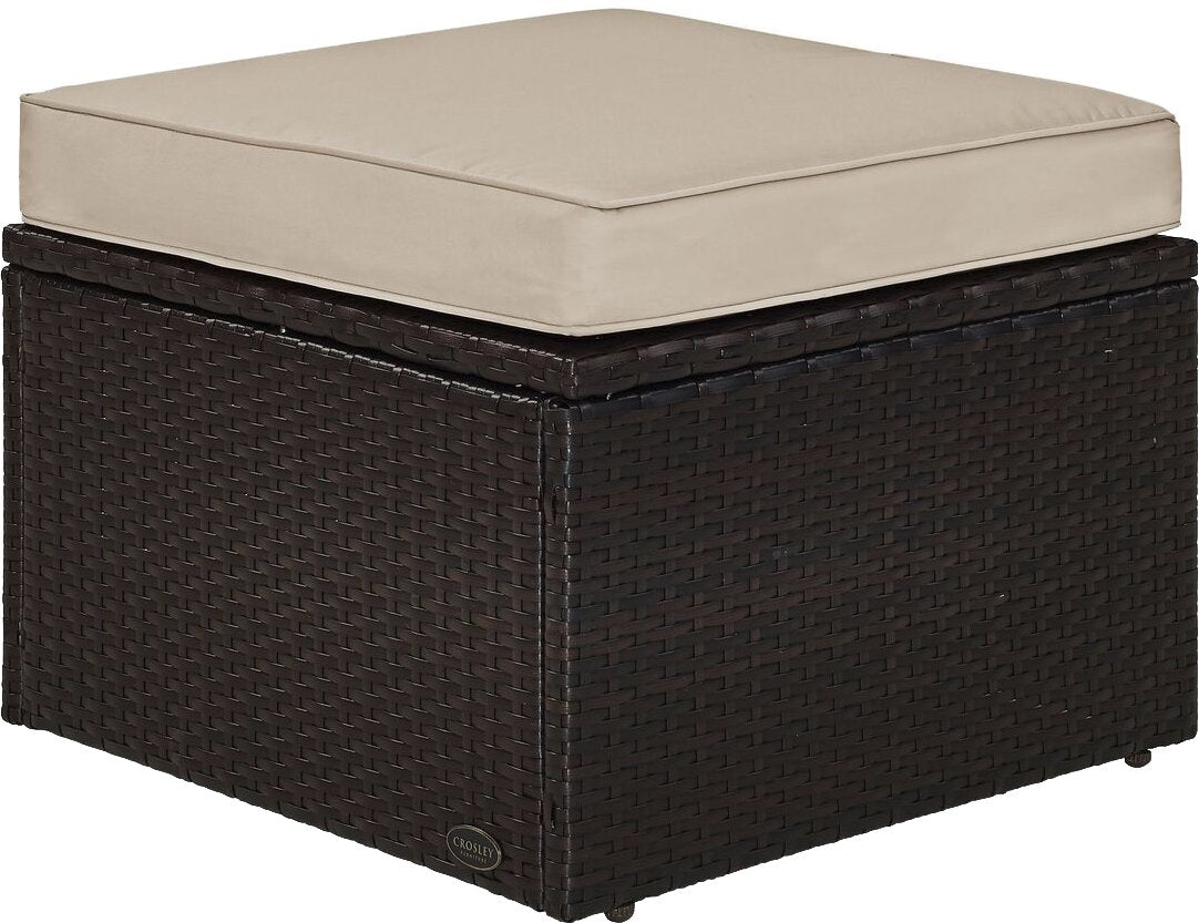 Crosley Palm Harbor ottoman front view showing wicker and cushion comfort