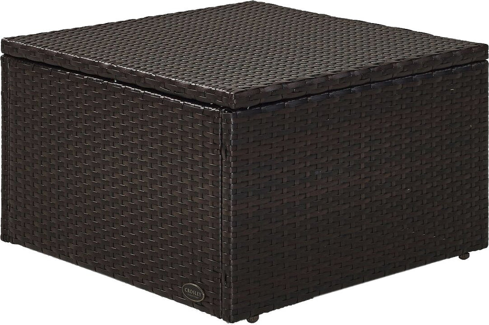Crosley Palm Harbor ottoman in patio lifestyle scene showing stylish outdoor living