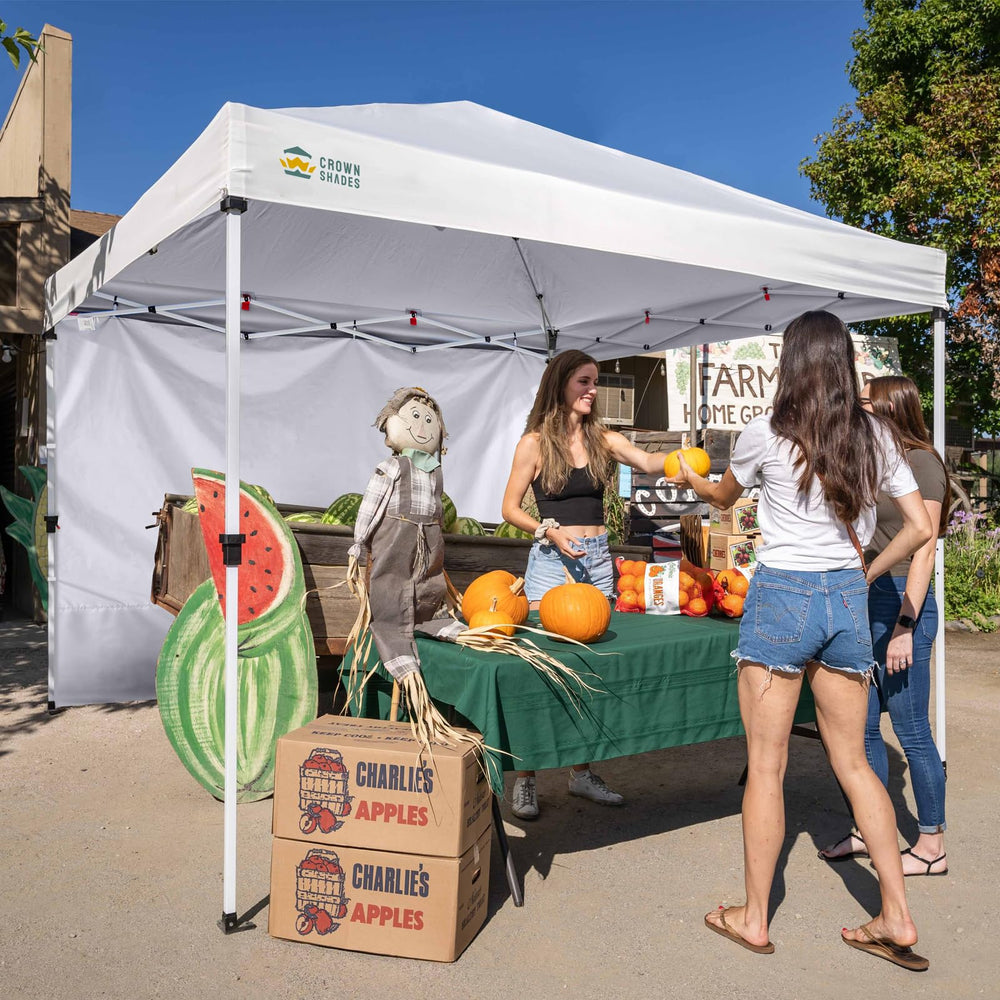 CROWN SHADES installed on canopy at a market showing sheltered display