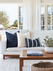 Crumbs Home lumbar pillow reverse solid dark navy providing a sleek alternative look
