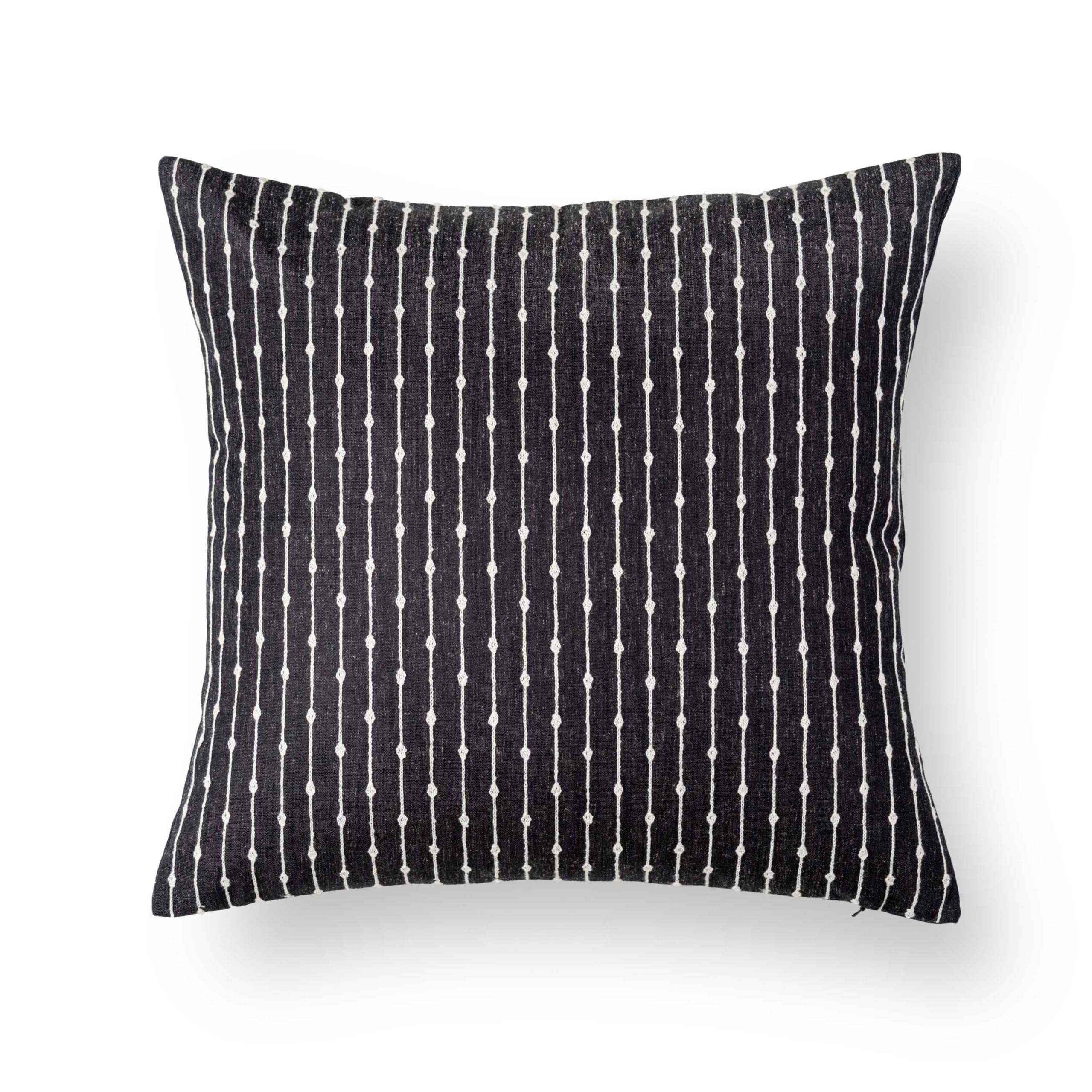Crumbs Home on patio sofa illustrating durable style for outdoor and indoor use