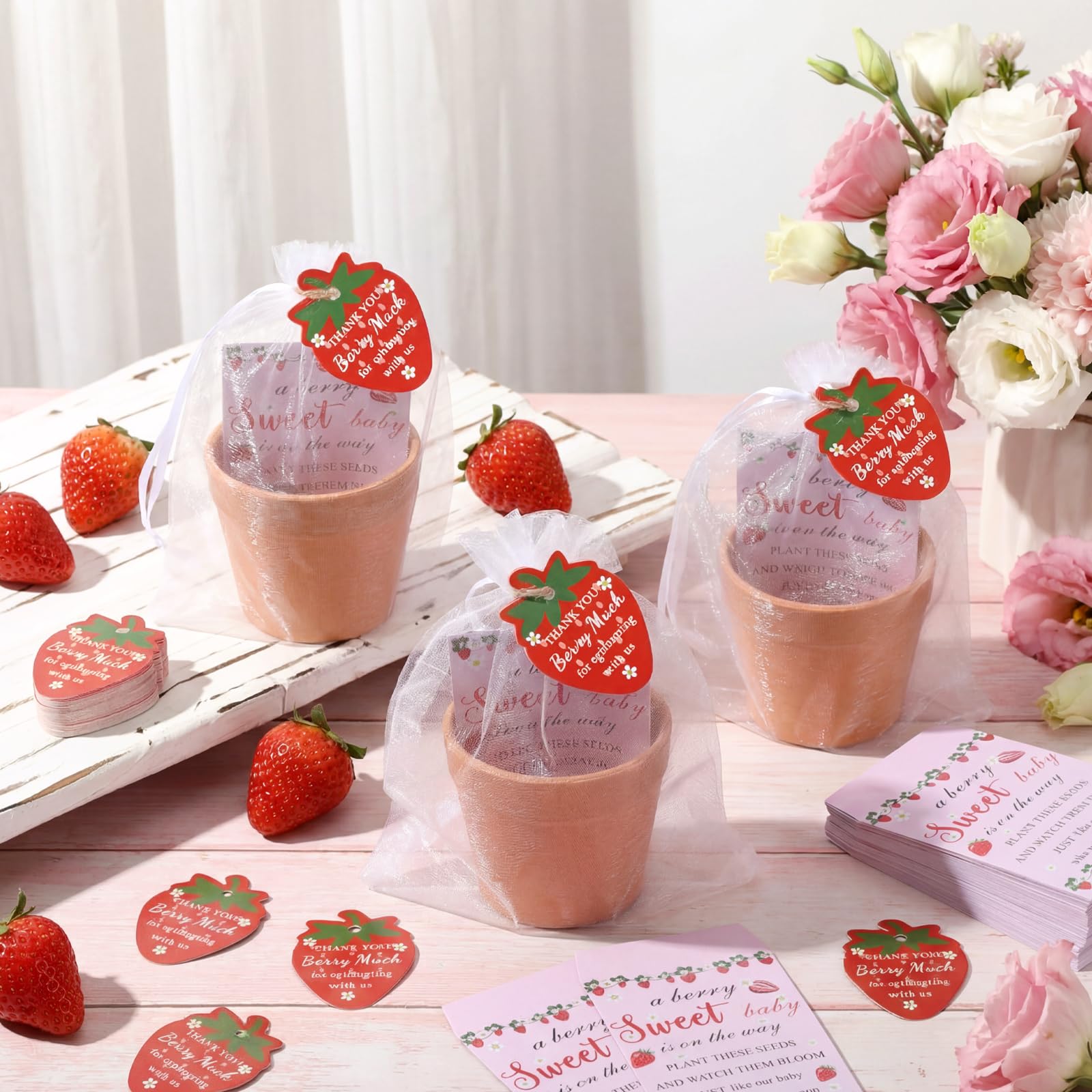 Ctosree styled table display at baby shower showing cohesive pink theme