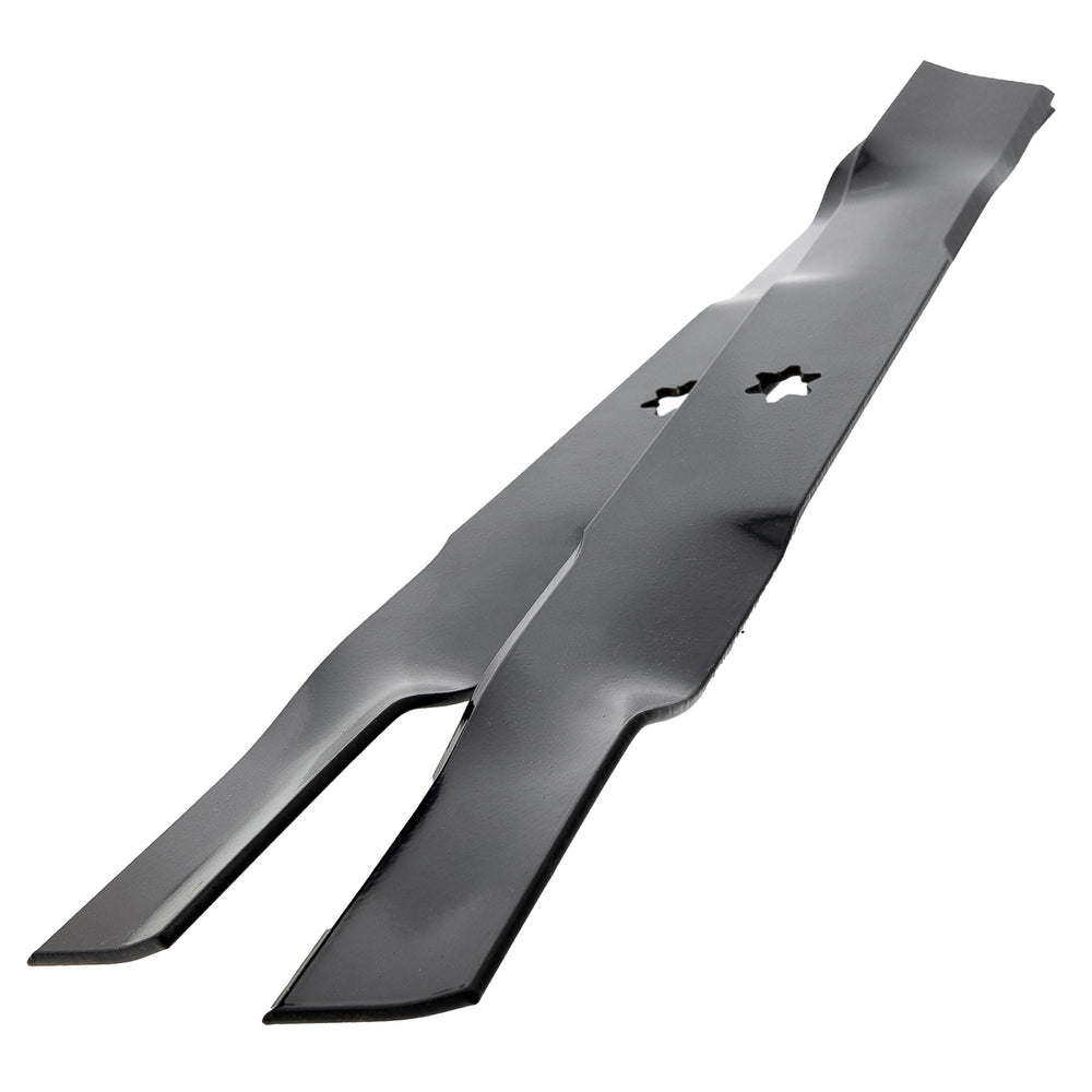 CUB CADET blades next to ruler for scale showing accurate sizing and compatibility