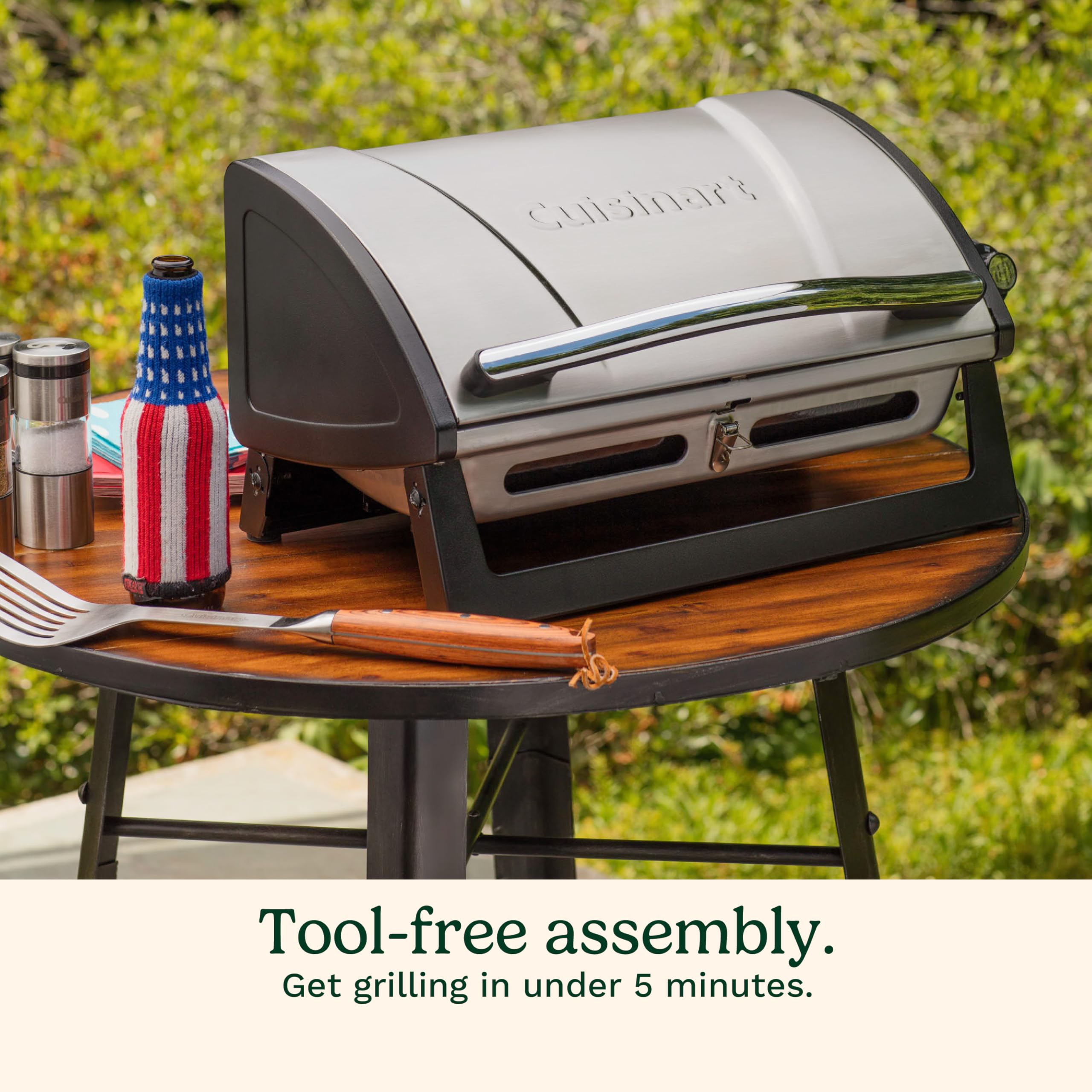 Cuisinart compact grill next to propane canister showing scale and space-saving benefit