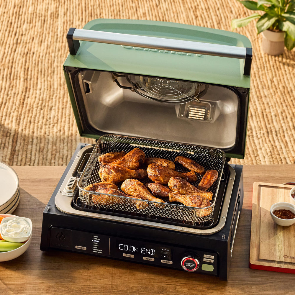 Cuisinart on a patio table with meal setup showing small-space entertaining use