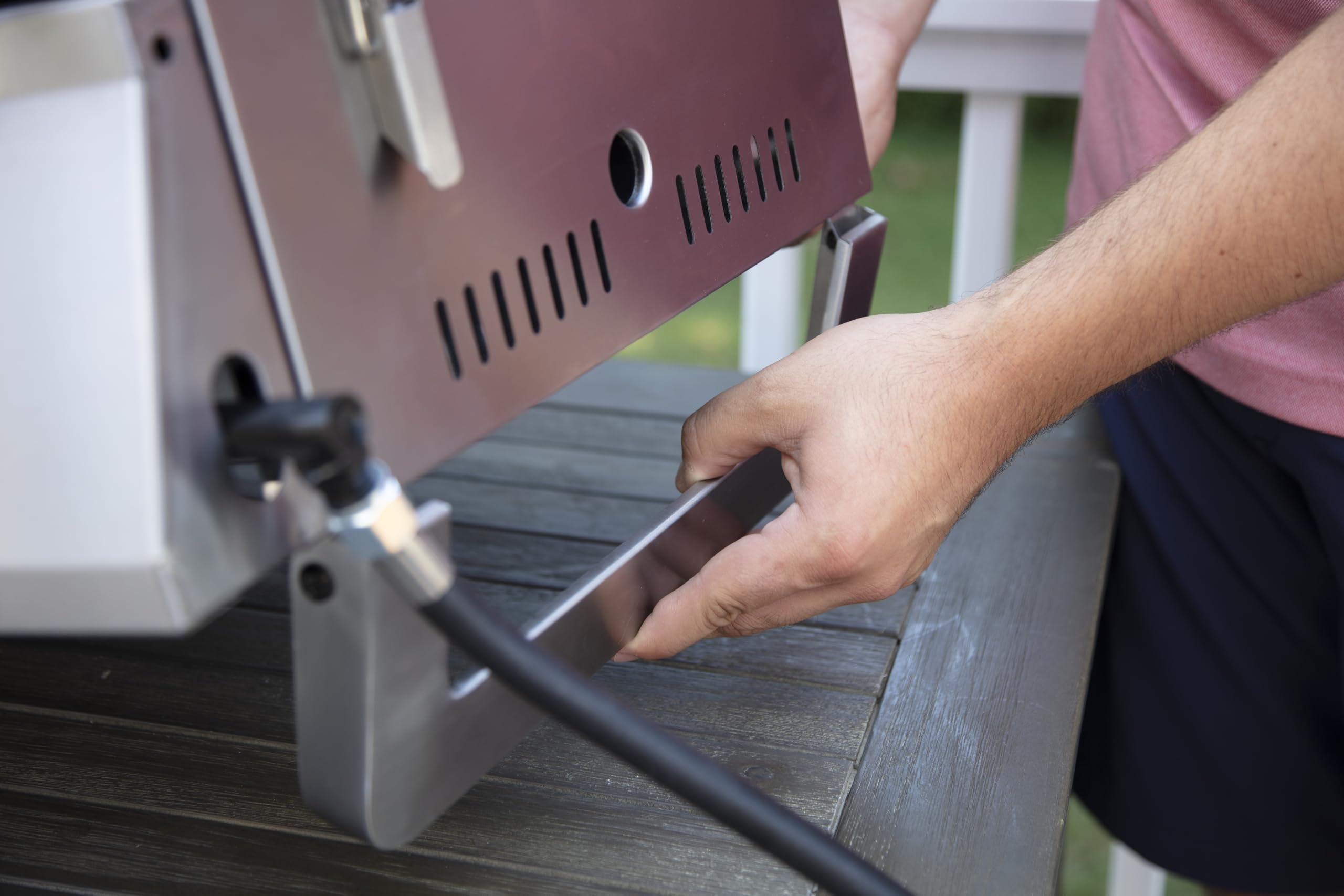 Cuisinart in a beach picnic setting grilling meals for outdoor convenience