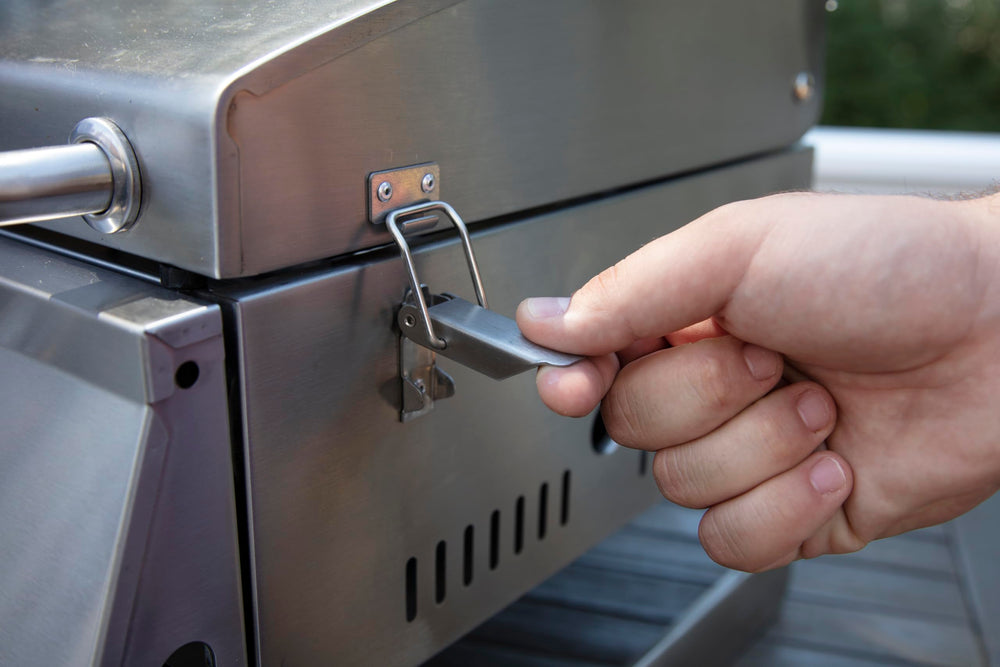 Cuisinart next to camping gear showing compact size and portability