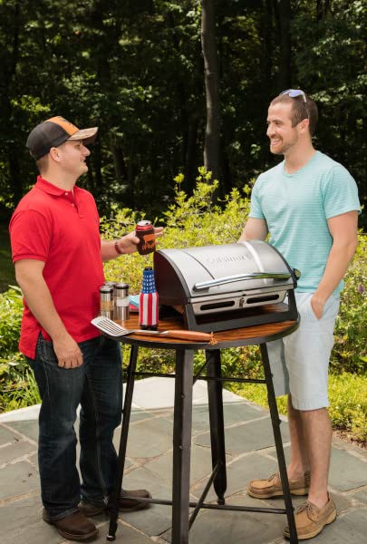 Cuisinart side profile of grill being carried illustrating lightweight portability