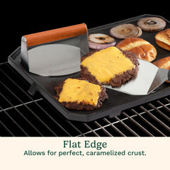 Cuisinart press held beside a hand to show 6-inch scale for consistent burger sizing