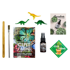 Cute Farms terrarium kit in use with hands assembling plants for a quick DIY project