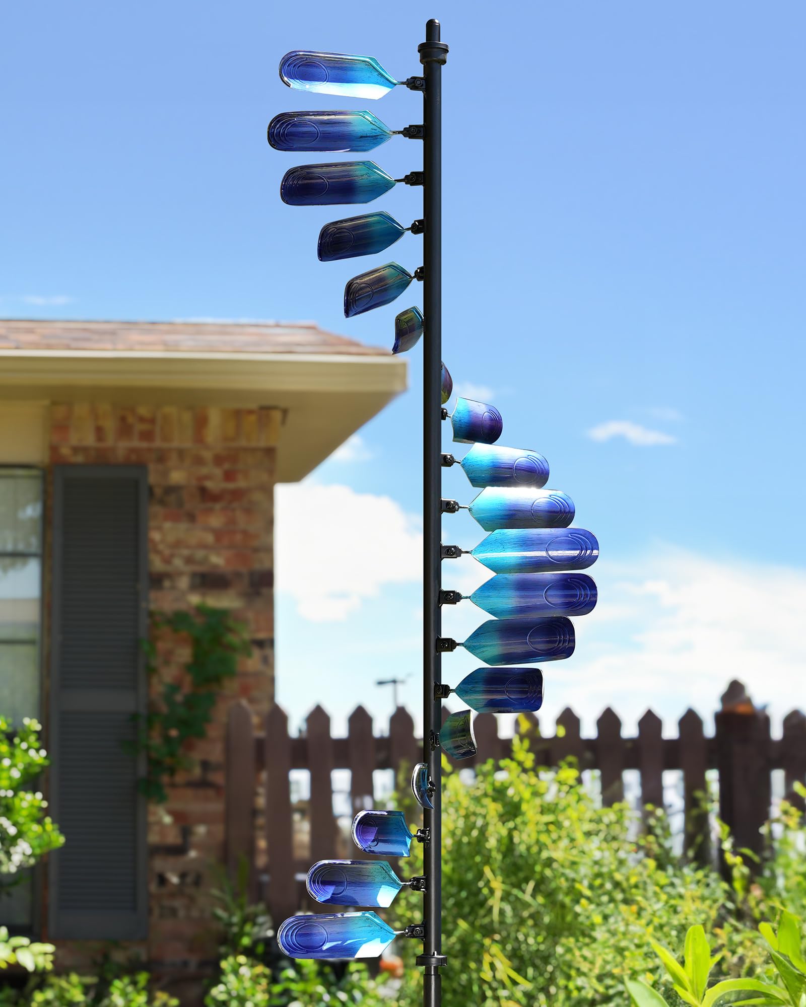 Cyan Oasis front view of peacock spiral showing dynamic motion and color