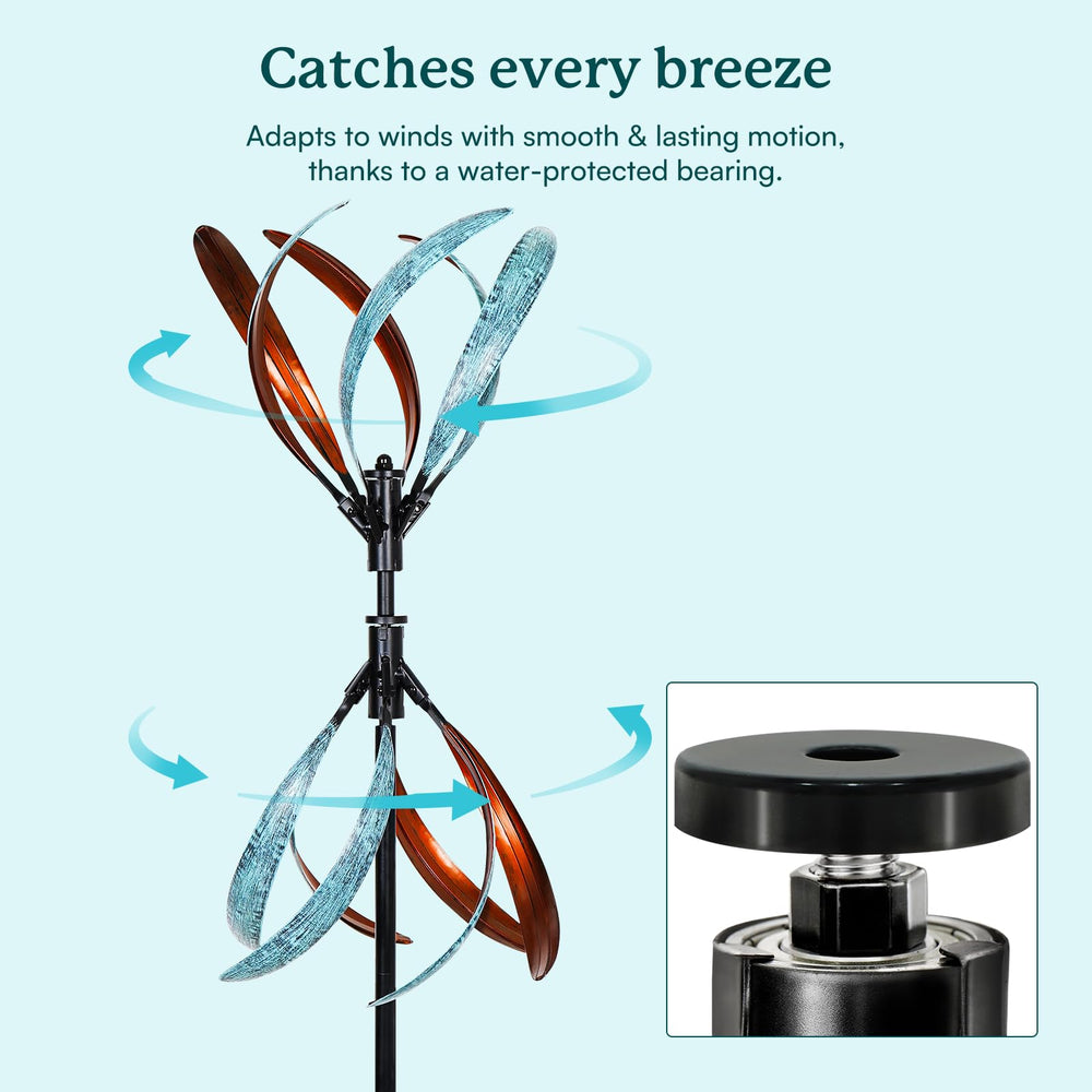 Cyan Oasis stake driven into soil with spinner attached, shows stable installation