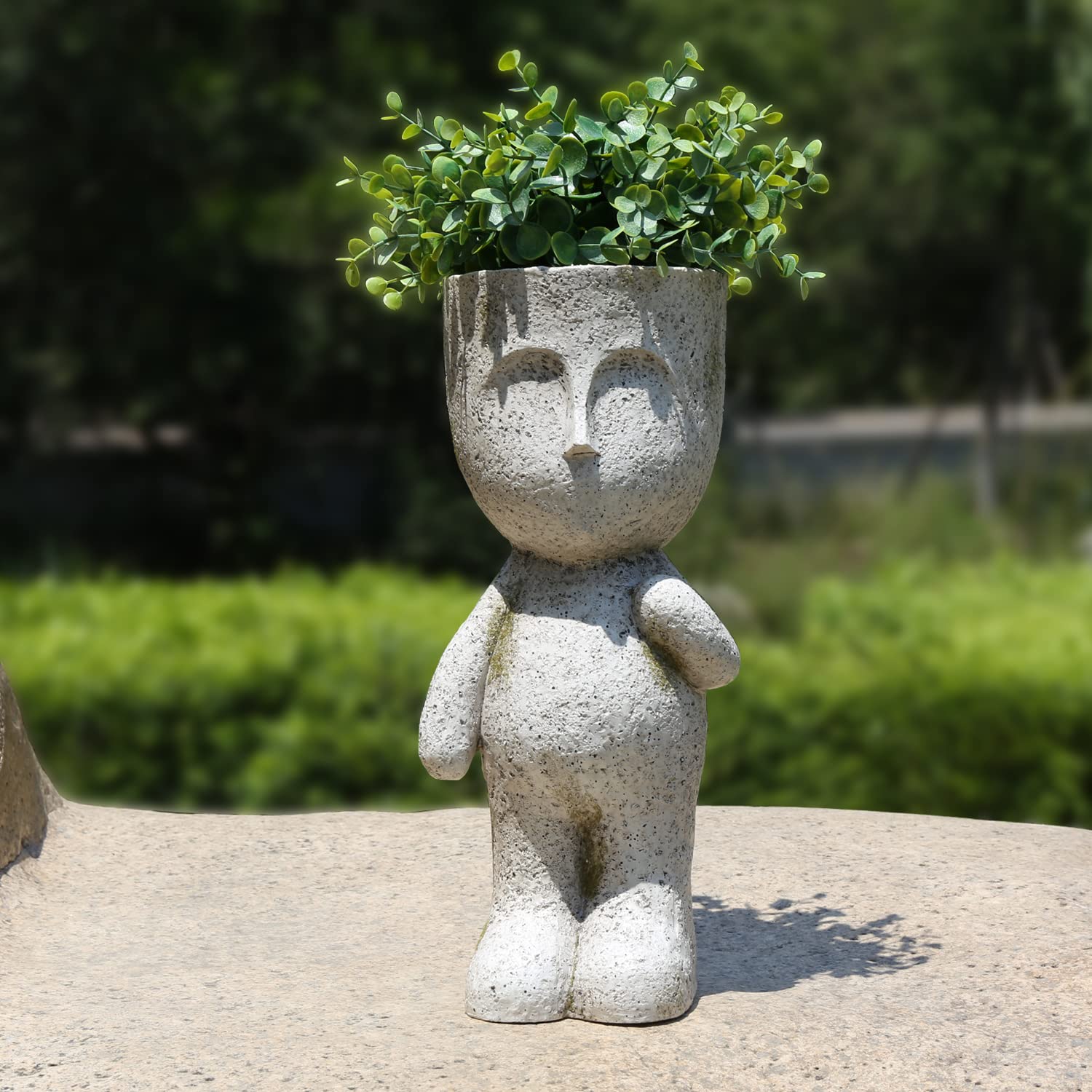 CYNOR planter styled on a patio table showing weatherproof use and visual charm outdoors