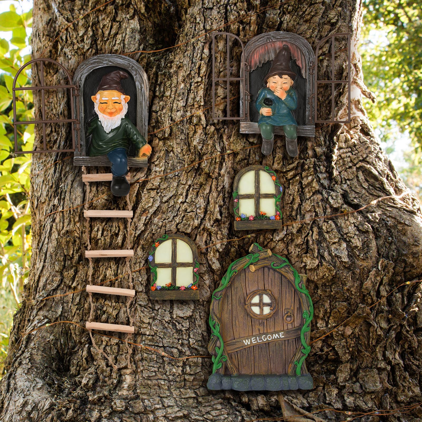 Czlotyh lifestyle garden display with multiple pieces arranged to create a miniature storybook scene