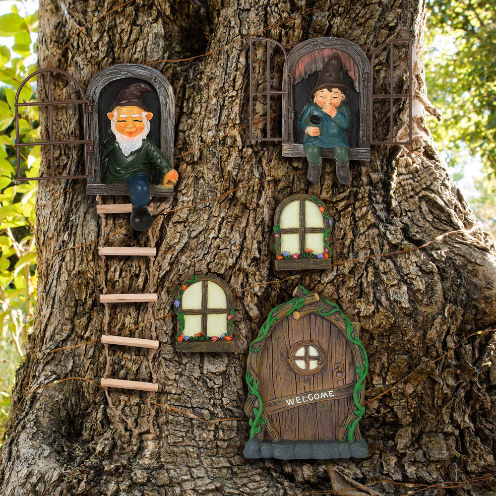 Czlotyh lifestyle garden display with multiple pieces arranged to create a miniature storybook scene