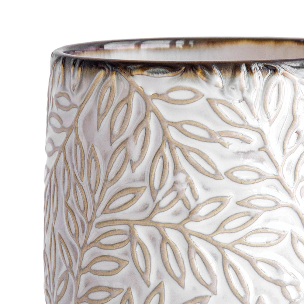 D'vine Dev planter styled on shelf with decor, adds modern botanical texture to room