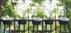 Dahey planter filled with herbs and flowers for easy kitchen access