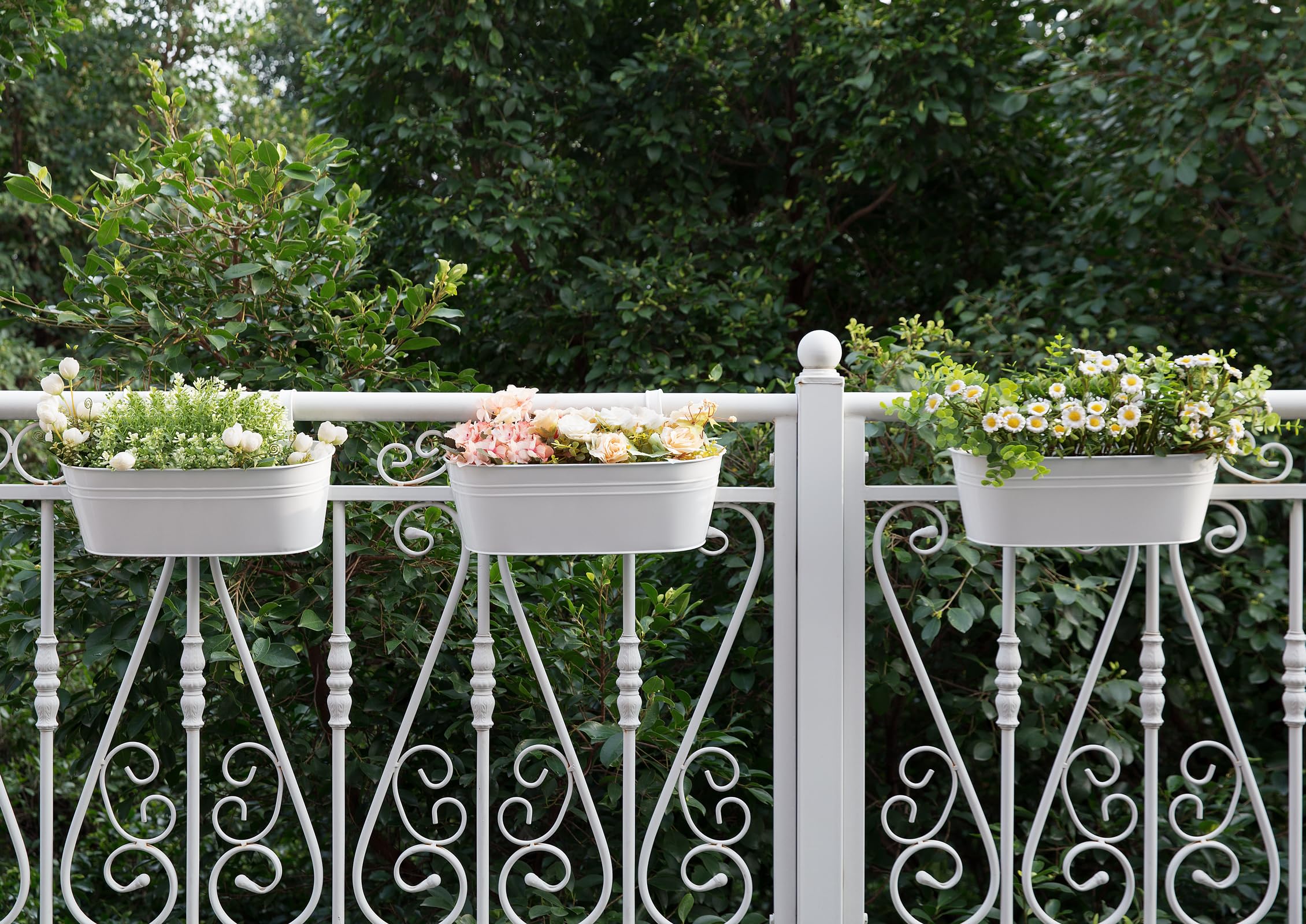 Dahey three-pack mounted on balcony rail creating continuous planting and curb appeal
