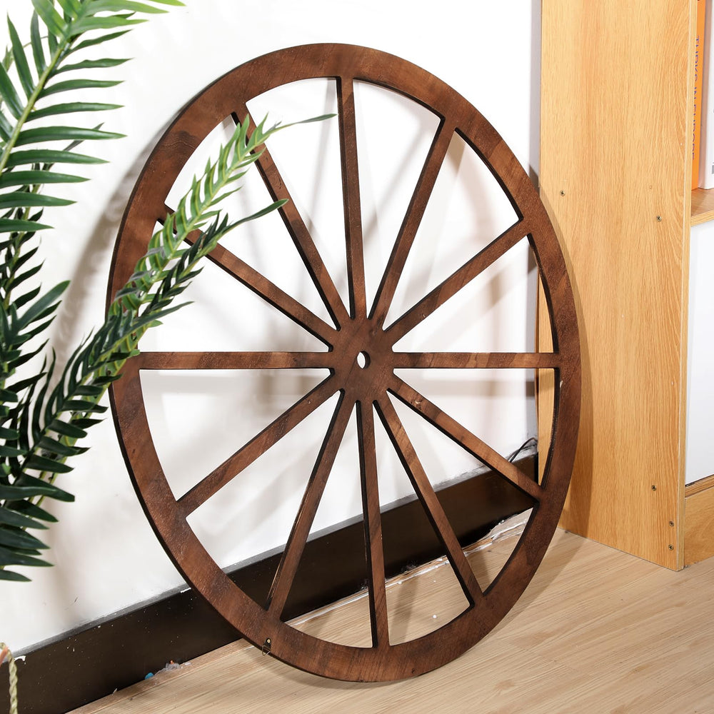 DaisyInner wagon wheel on garden fence creating charming outdoor accent