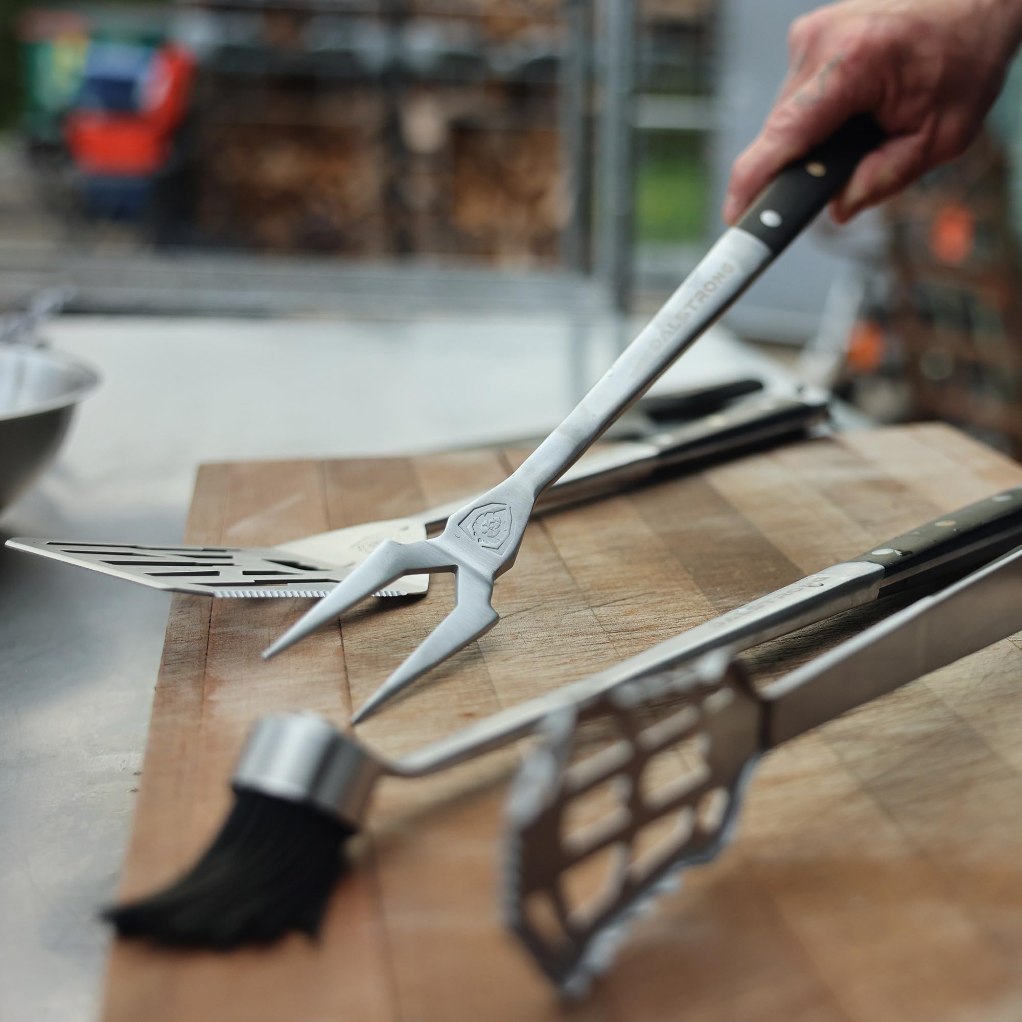 Dalstrong tools beside ruler for size comparison offering proper reach