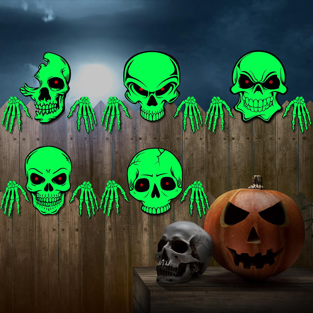 Dandat skulls mounted on a wooden fence creating an instant Halloween atmosphere