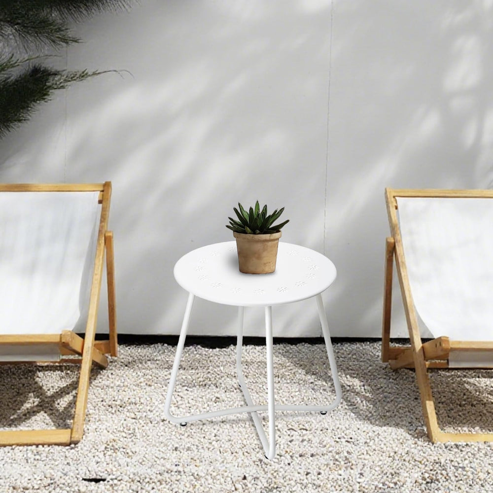 danpinera table holding drinks and plant shows practical surface benefit