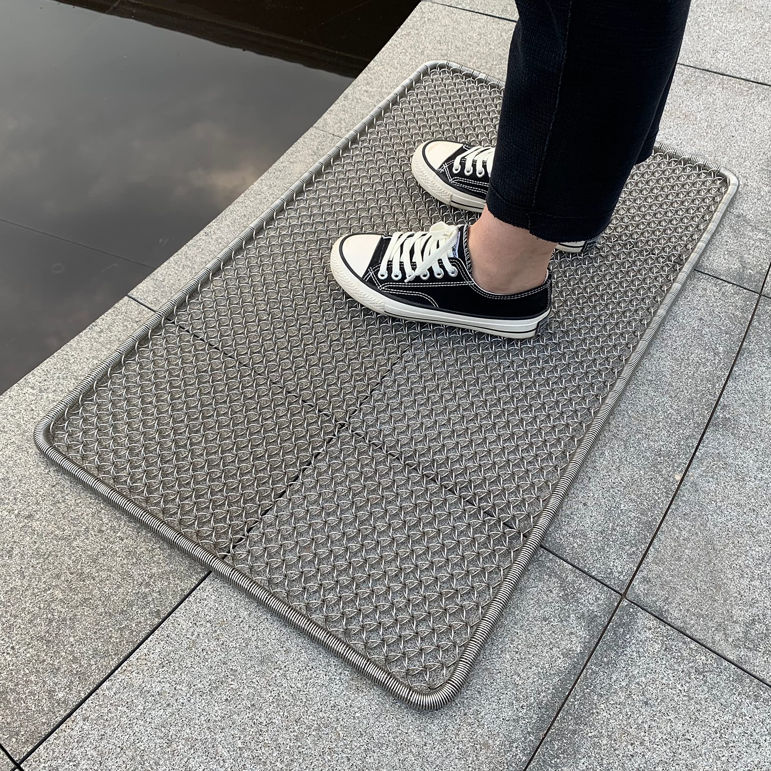 DAOMAER front view of metal doormat showing sturdy scrape surface and entry protection
